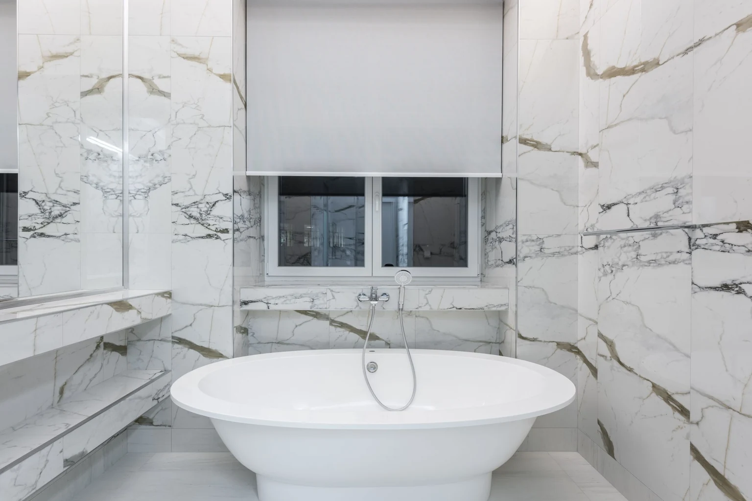 Marble bathroom with a freestanding tub